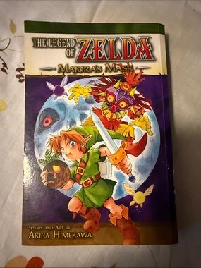 💰 5 for $20 💰
 The Legend of Zelda: Majora's Mask Graphic Novel - Purple Cover b